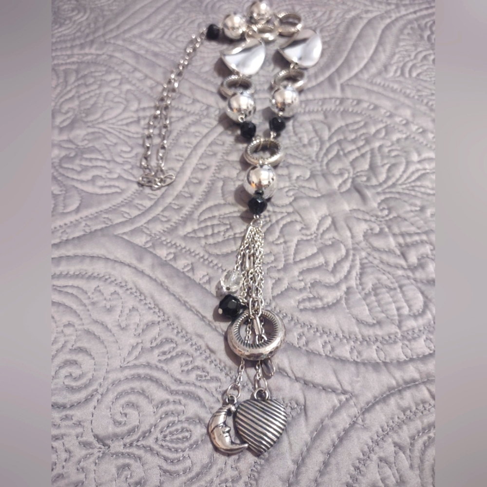 Silver & Black Necklace 14in with a 6 in., Tassell that holds a Heart and Moon